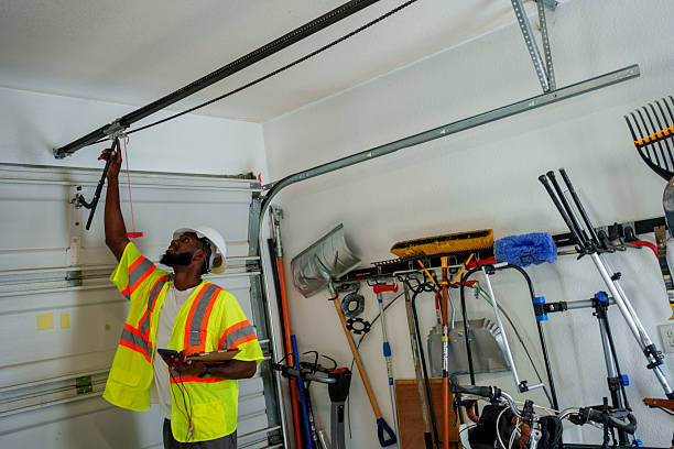 Professional Garage Door Panel Replacement technician working in Cadillac, MI